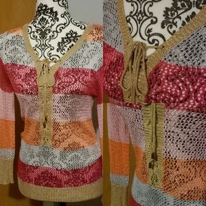 Shimmery crochet v neck lace up long sleeve top